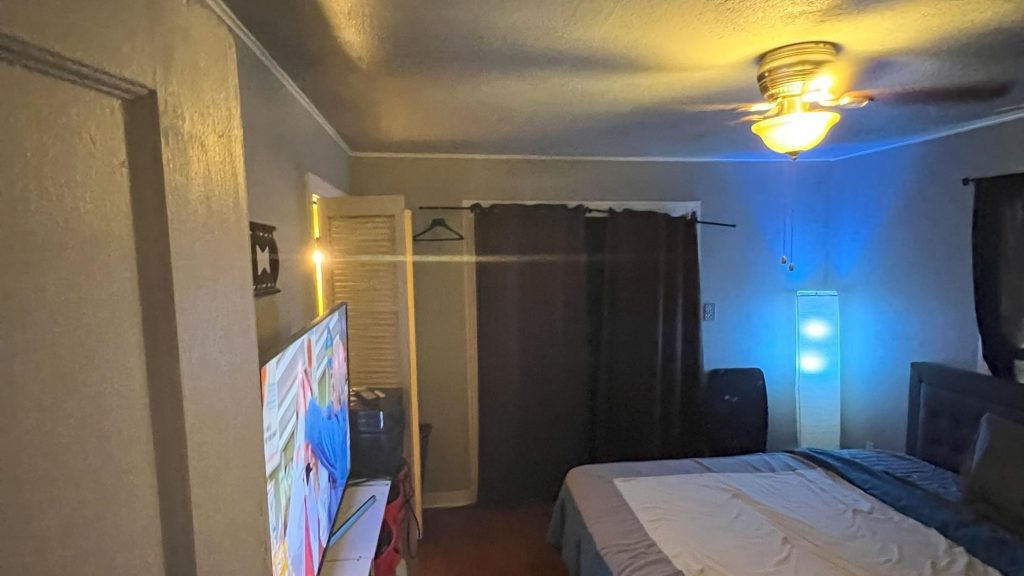 Simple, outdated bedroom