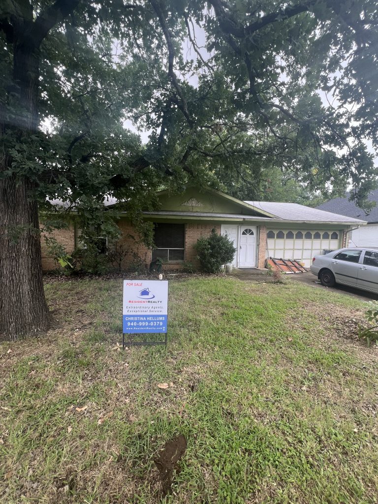 Original exterior with overgrown plants