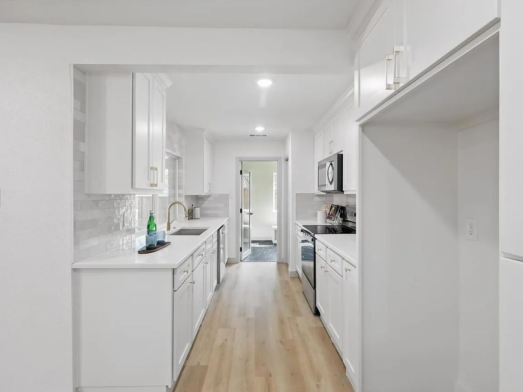 Brand new white kitchen with custom island
