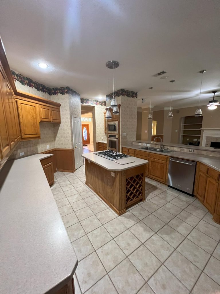 Old oak kitchen cabinets with island